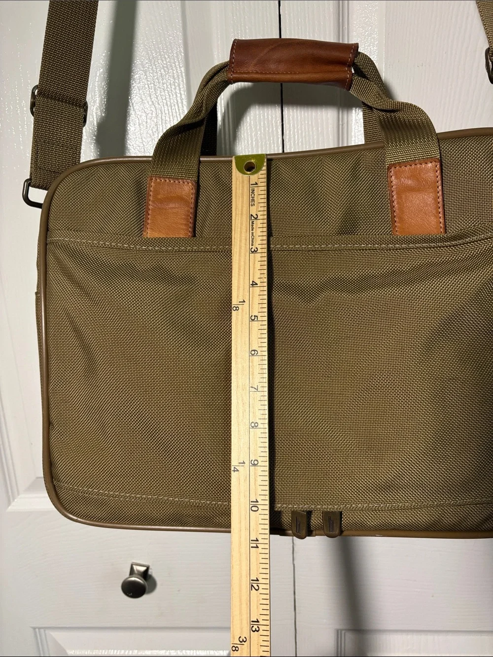 Hartmann nylon and leather  travel case with trolley sleeve.